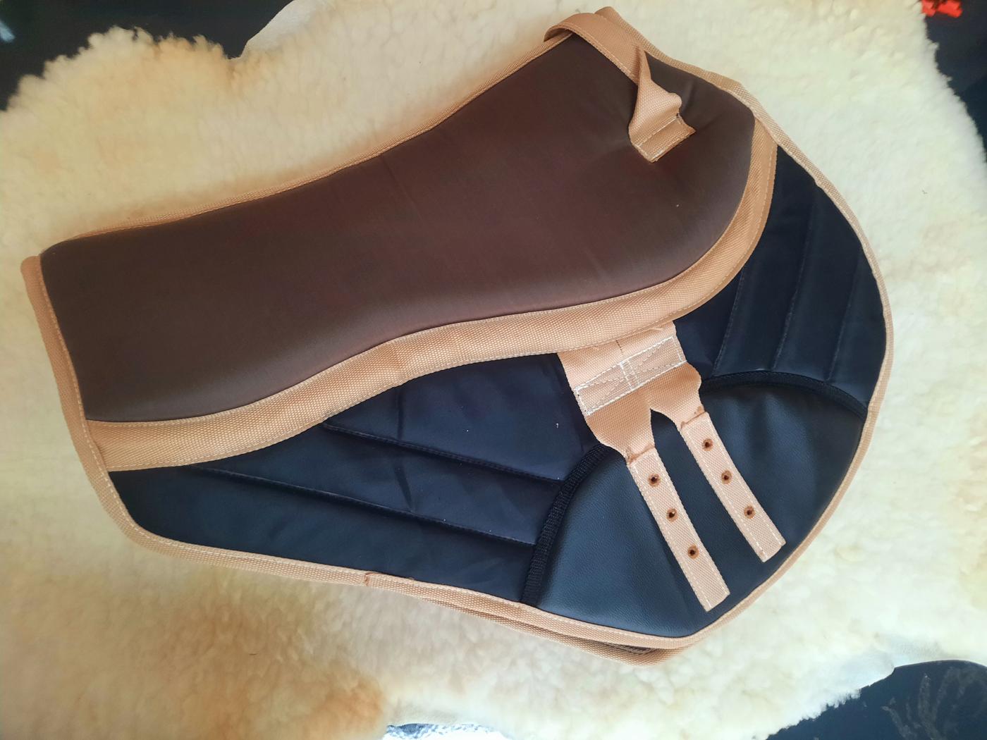 Water resistant saddle cover with fleece lining handmade by Horsin' About