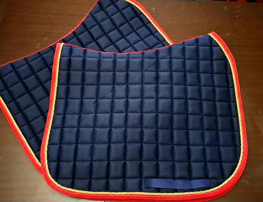 Saddle shaped numnah handmade by Horsin' About